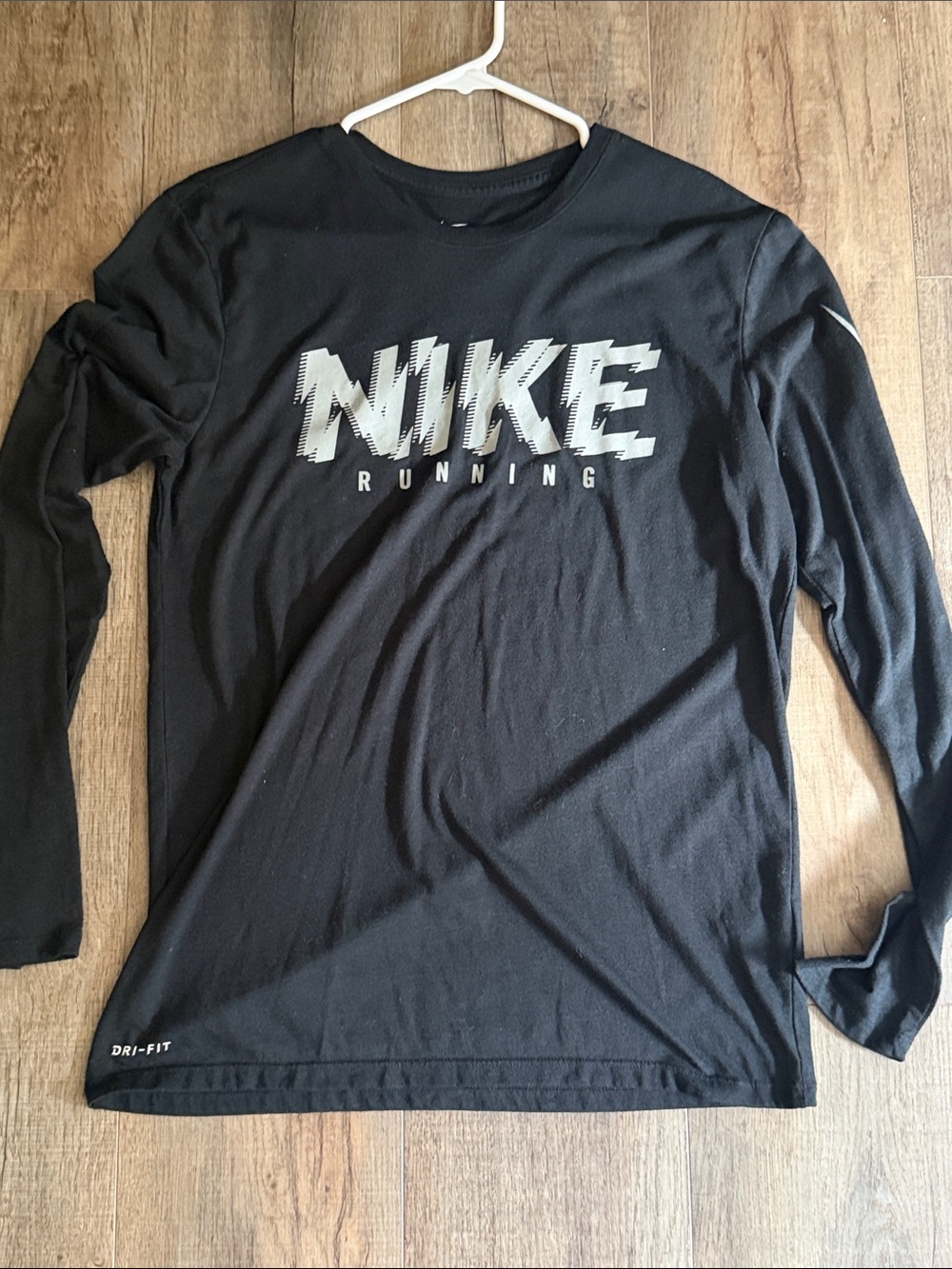 Nike women’s Black Running Dri-FIT Long Sleeve Shirt